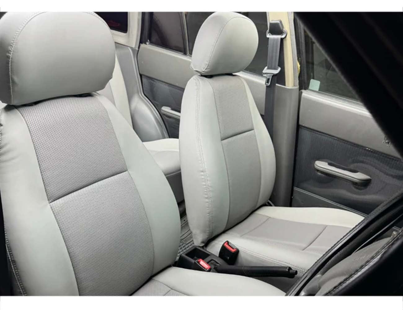 Bespoke seat covers for Suzuki Cultus 2000-2017, made of fully synthetic fabric, offering comfort, protection, and a custom fit.