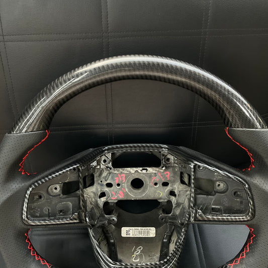 Honda Civic 2016-2021 Carbon Fiber Steering Wheel, featuring a premium sporty design, ergonomic grip, and luxurious finish.