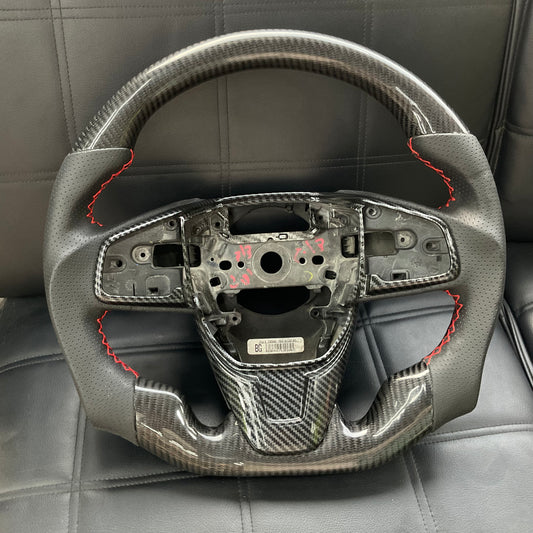 Honda Civic 2016-2021 Carbon Fiber Steering Wheel, featuring a premium sporty design, ergonomic grip, and luxurious finish.