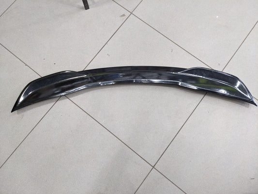 Honda Civic 2022-2025 Carbon Fiber Trunk Spoiler, featuring a sleek design, aerodynamic performance, and a lightweight yet durable build for a sporty appearance.