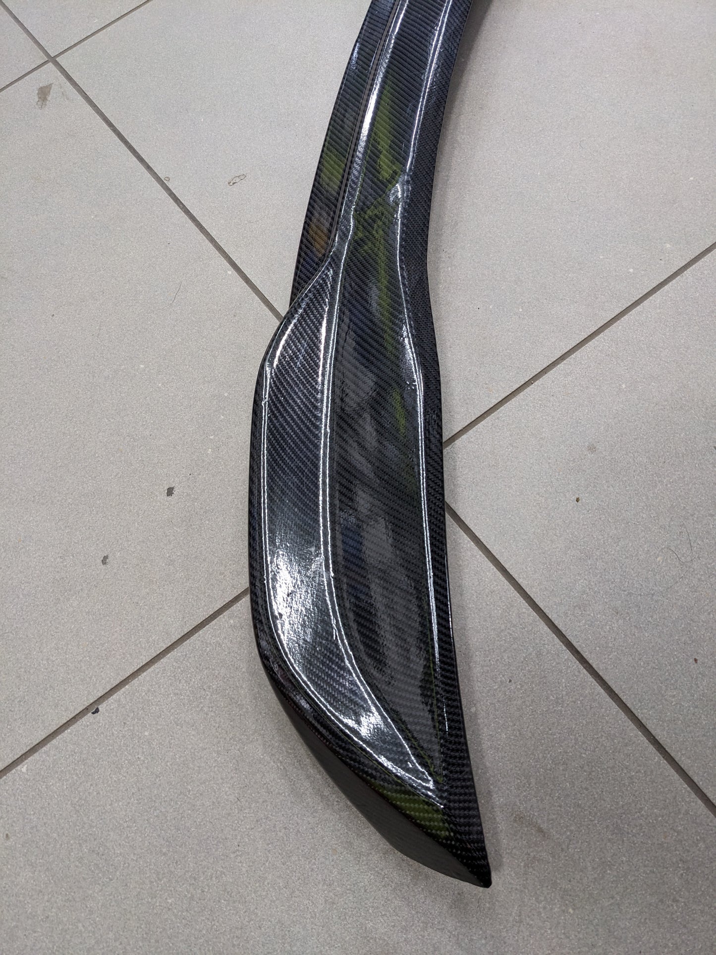 Honda Civic 2022-2025 Carbon Fiber Trunk Spoiler, featuring a sleek design, aerodynamic performance, and a lightweight yet durable build for a sporty appearance.