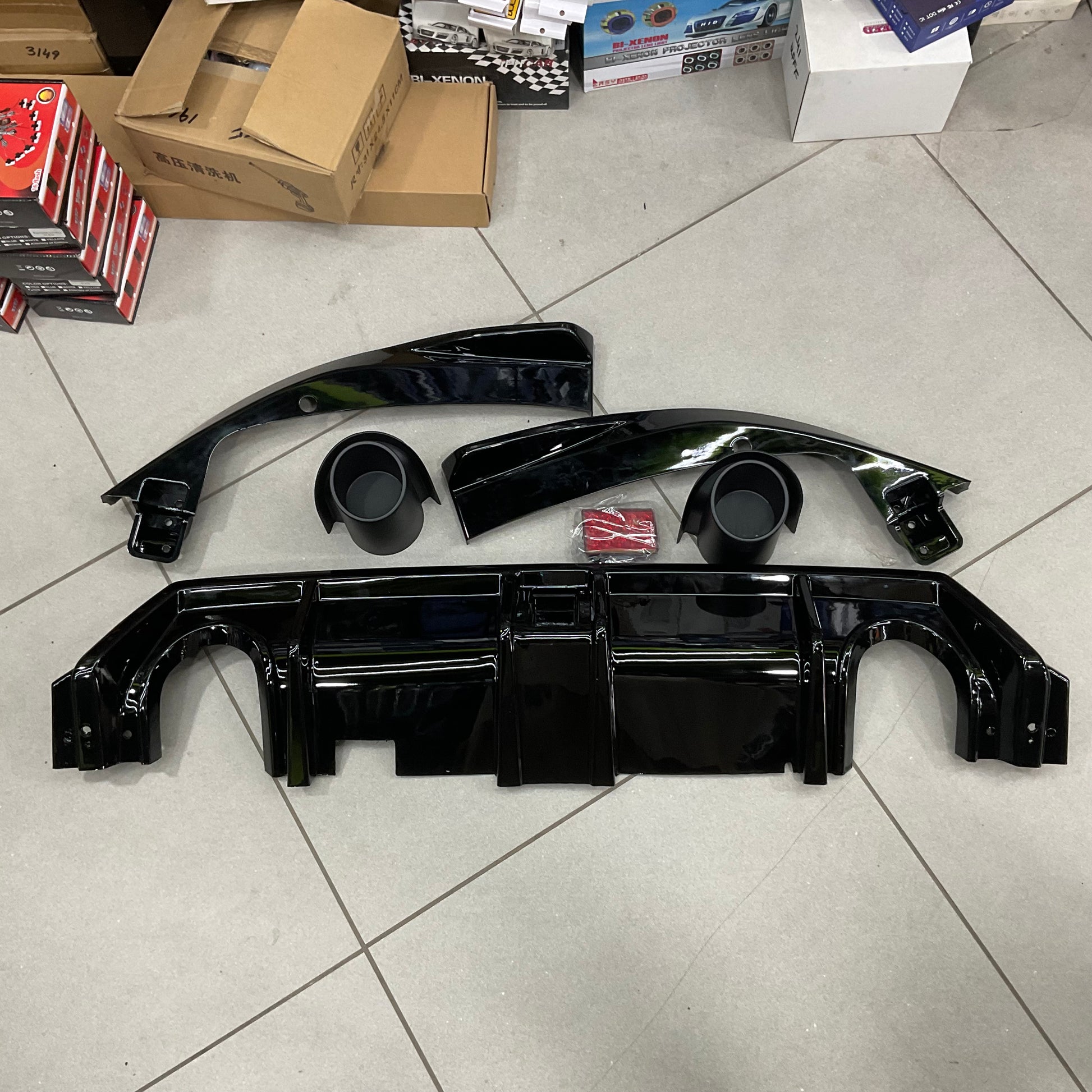 Honda Civic X (2016-2021) Back Bumper Diffuser, designed to improve aerodynamics and add a sporty touch to your vehicle's rear bumper.