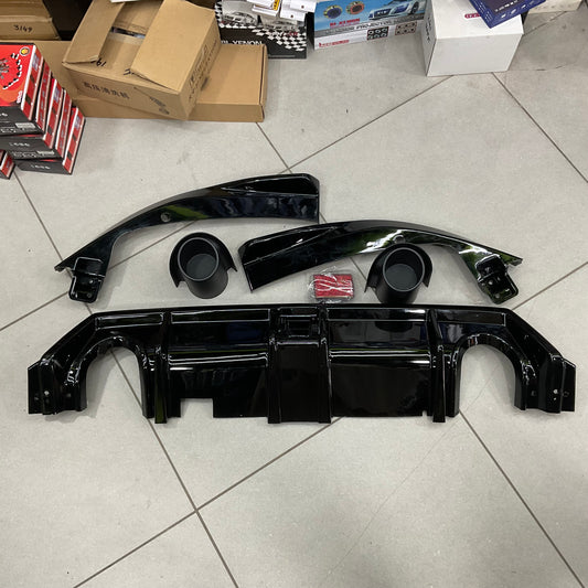 Honda Civic X (2016-2021) Back Bumper Diffuser, designed to improve aerodynamics and add a sporty touch to your vehicle's rear bumper.