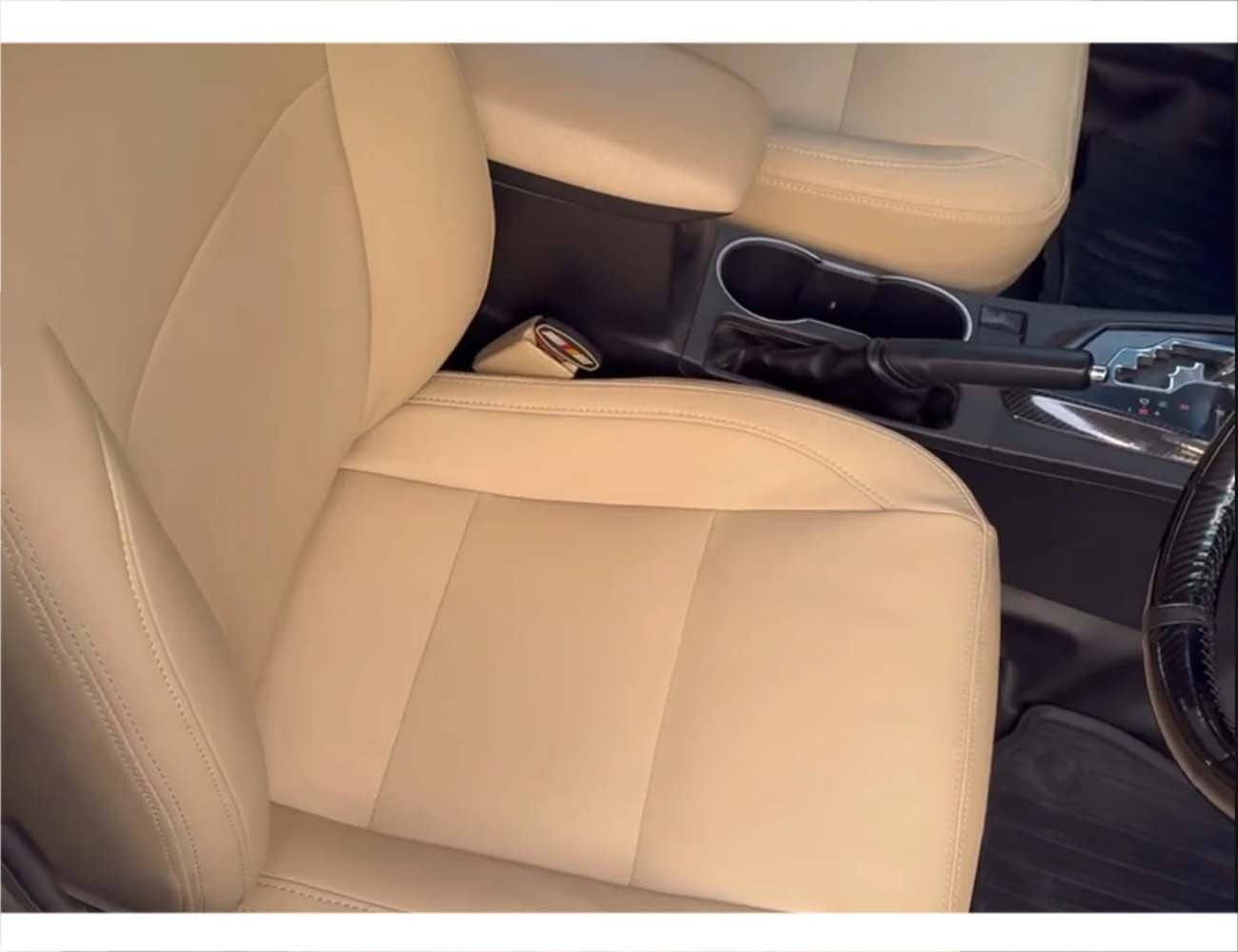 Premium bespoke beige seat covers for Toyota Corolla Grande GLI/Altis, providing a luxurious and custom-fit upgrade for your car’s interior.