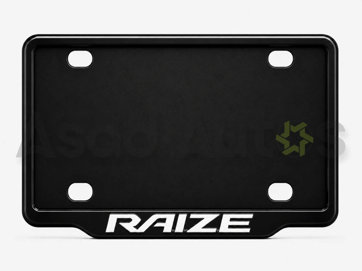 Raptic number plate frame fitted on Toyota Raize front plate area - Asad Autos