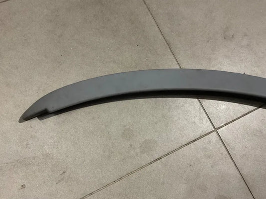 Toyota Vitz ABS plastic roof spoiler with a sleek and sporty design, offering durability and weather resistance.