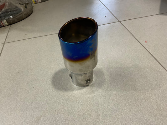 Universal HKS muffler exhaust small silencer tip installed on a car, showcasing a sporty and stylish design.