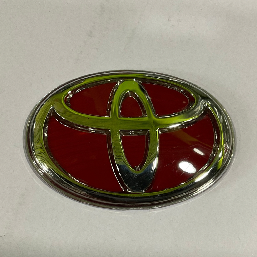 Toyota Silver and Reddish Design Emblem