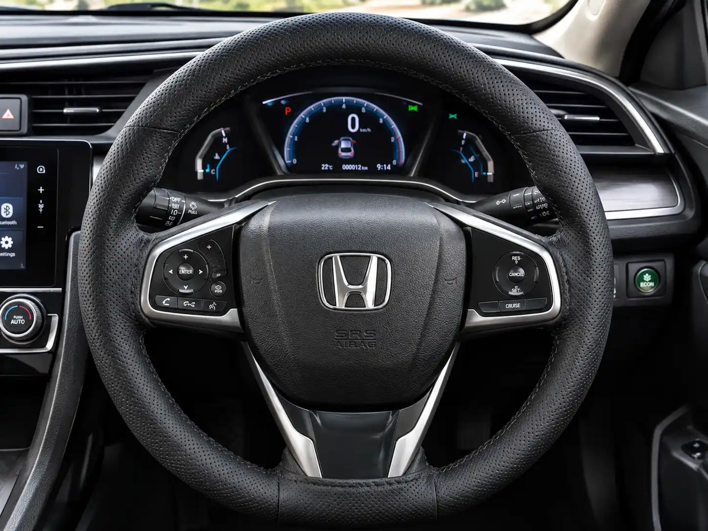 Leather stitchable steering wheel cover fitted on car steering wheel