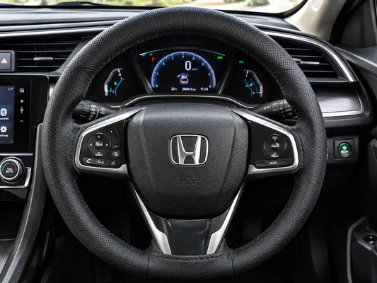 Leather stitchable steering wheel cover fitted on car steering wheel
