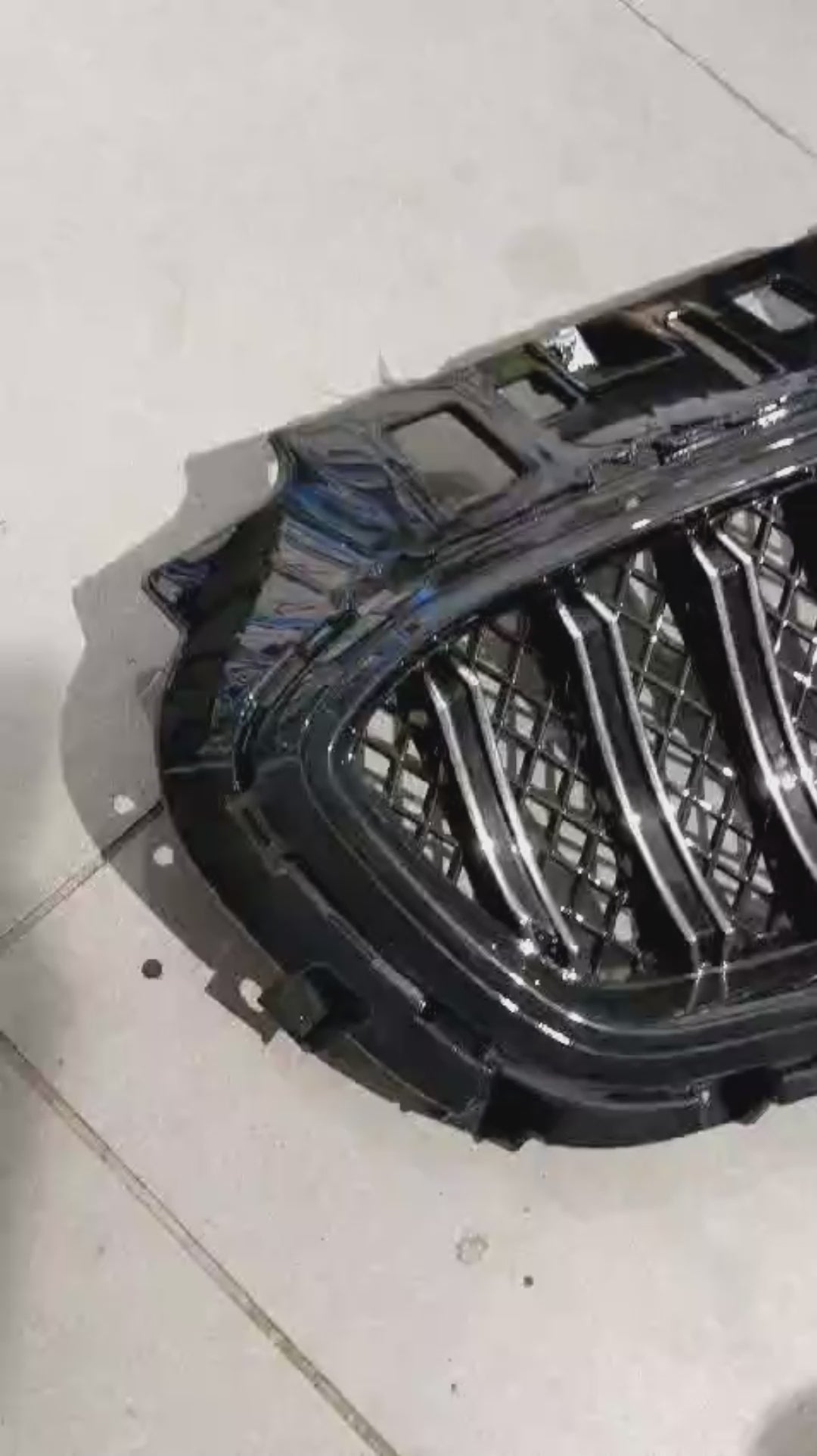 Kia Sportage glossy front grill, designed to add a sleek and premium touch to your vehicle’s front-end appearance.