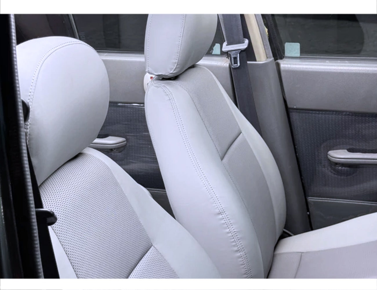 Bespoke seat covers for Suzuki Cultus 2000-2017, made of fully synthetic fabric, offering comfort, protection, and a custom fit.