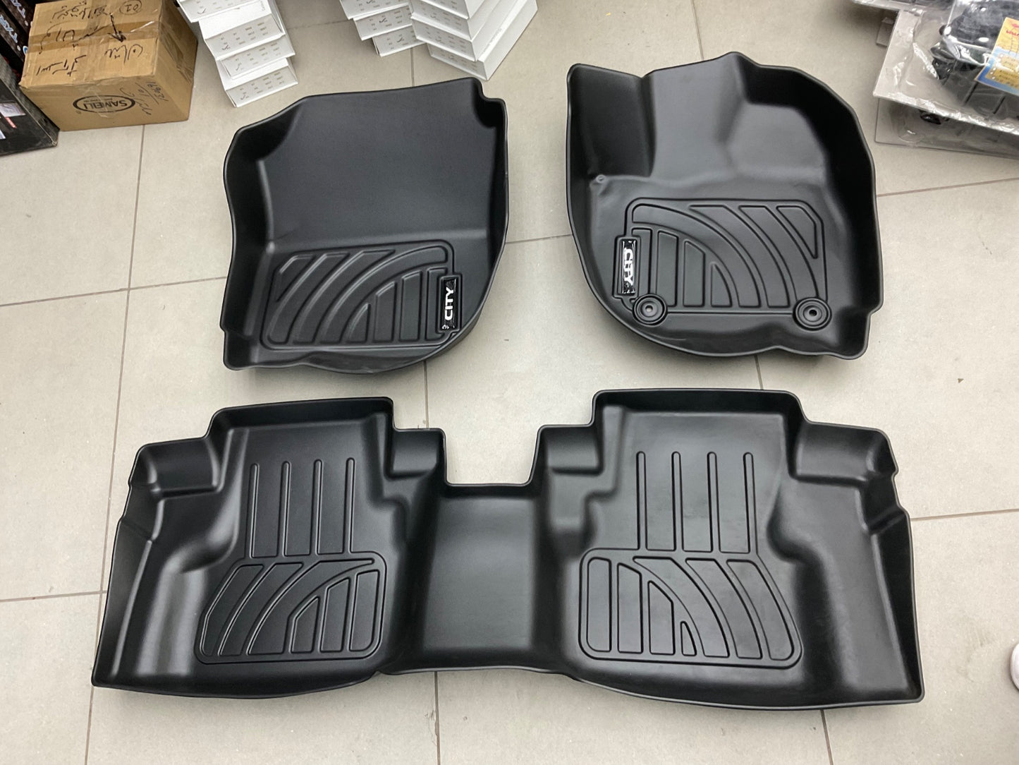 Custom-fit TPE floor mats for Honda City (2021-2025) with all-weather protection and eco-friendly material.
