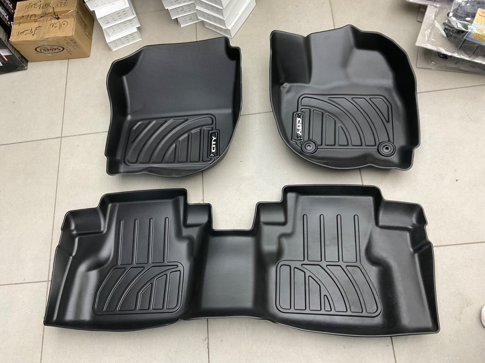 Custom-fit TPE floor mats for Honda City (2021-2025) with all-weather protection and eco-friendly material.
