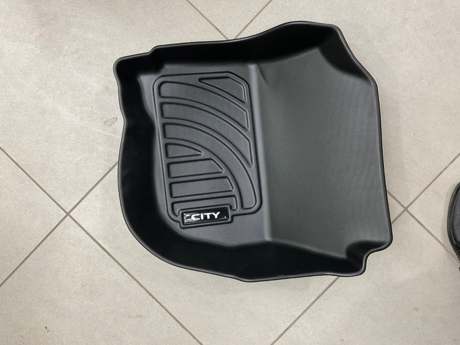 Custom-fit TPE floor mats for Honda City (2021-2025) with all-weather protection and eco-friendly material.
