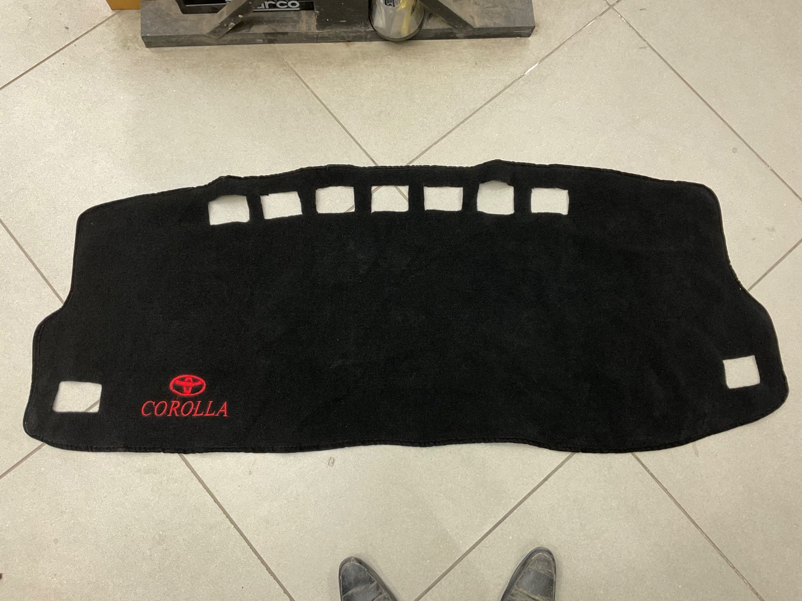 "Custom-fit dashboard carpet mat for Toyota Corolla 2015-2025, offering heat resistance, sun protection, and a stylish interior upgrade."

