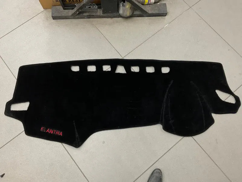 "Custom dashboard carpet mat for Hyundai Elantra, providing heat protection, glare reduction, and a premium interior finish."
