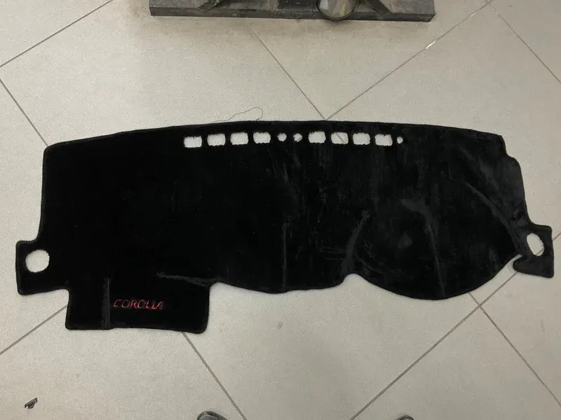 "Custom dashboard carpet mat for Toyota Corolla, offering UV protection, heat resistance, and a stylish interior upgrade."
