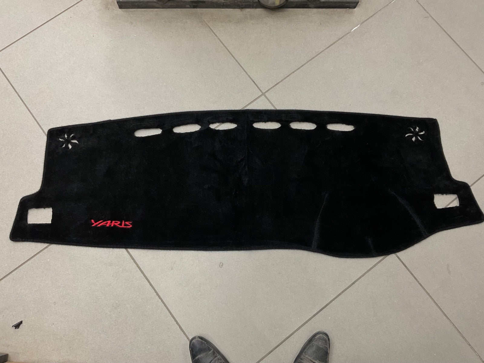 "Custom dashboard carpet mat for Toyota Yaris 2018-2025, offering UV protection, glare reduction, and a sleek interior upgrade."

