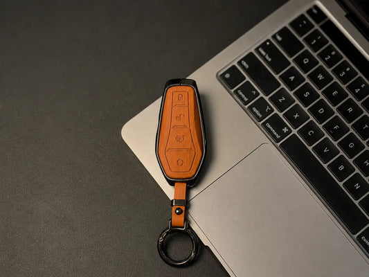 Give your smart key premium protection with an elegant leather-and-metal cover