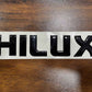 Toyota Revo Hilux Glossy Black Monogram / Emblem / Logo – Premium Exterior Badge Upgrade