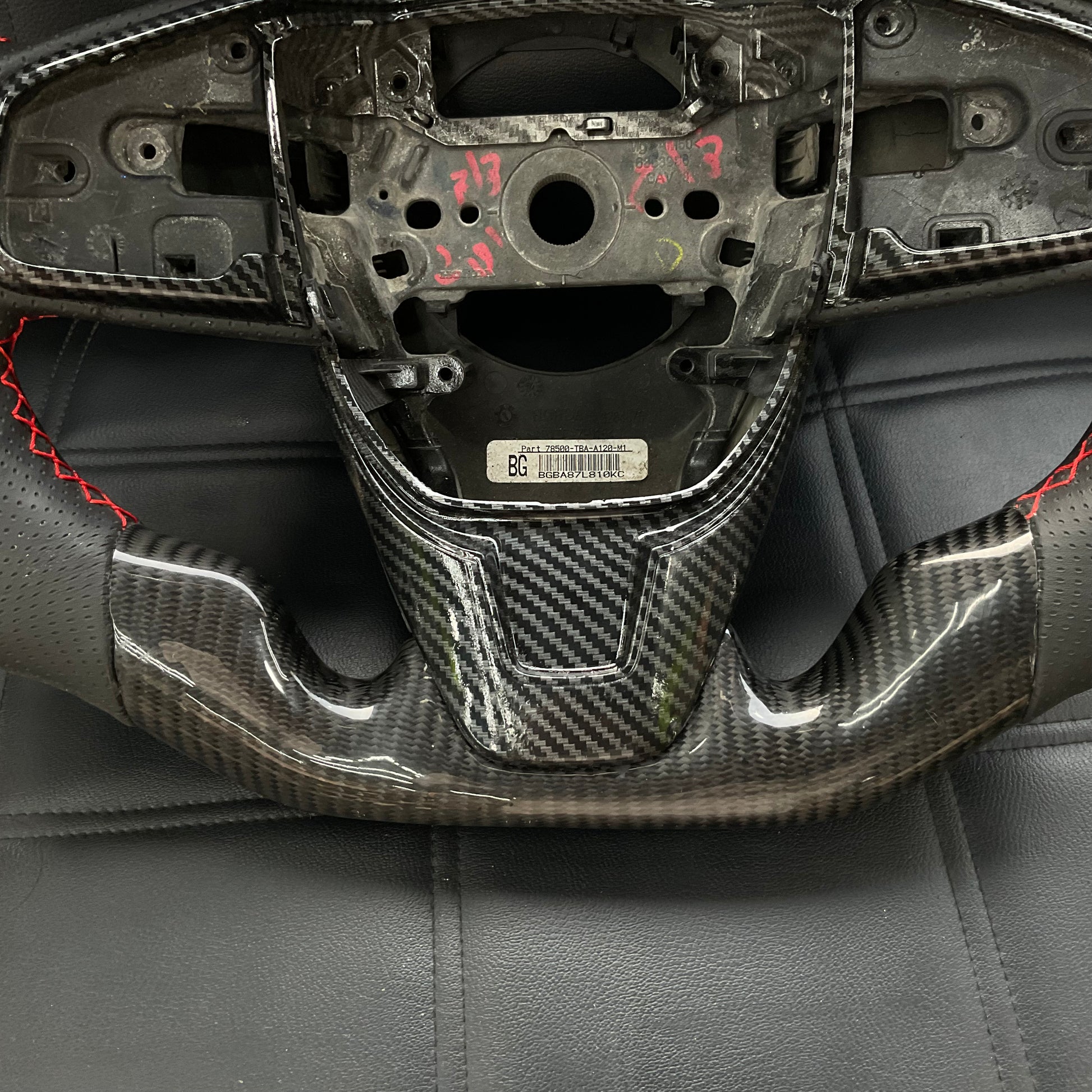 Honda Civic 2016-2021 Carbon Fiber Steering Wheel, featuring a premium sporty design, ergonomic grip, and luxurious finish.