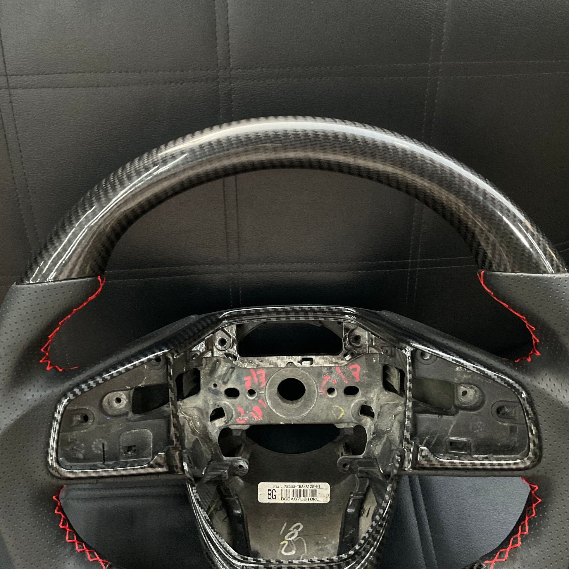 Honda Civic 2016-2021 Carbon Fiber Steering Wheel, featuring a premium sporty design, ergonomic grip, and luxurious finish.
