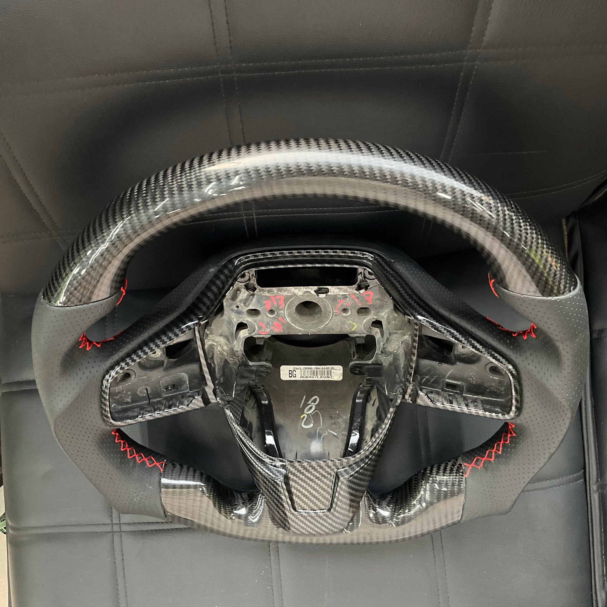 Honda Civic 2016-2021 Carbon Fiber Steering Wheel, featuring a premium sporty design, ergonomic grip, and luxurious finish.