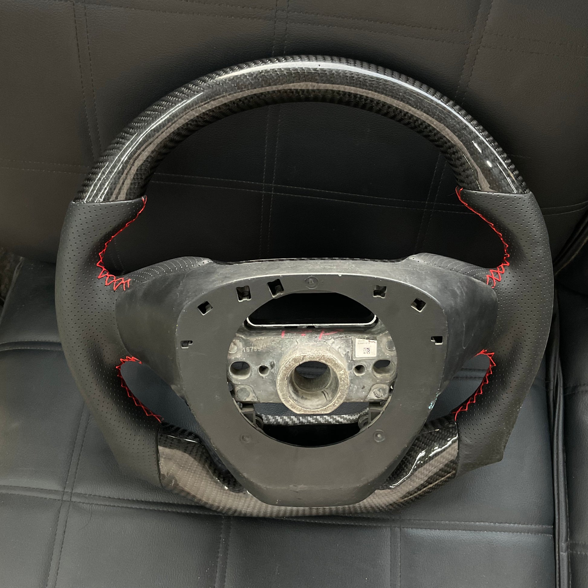 Honda Civic 2016-2021 Carbon Fiber Steering Wheel, featuring a premium sporty design, ergonomic grip, and luxurious finish.