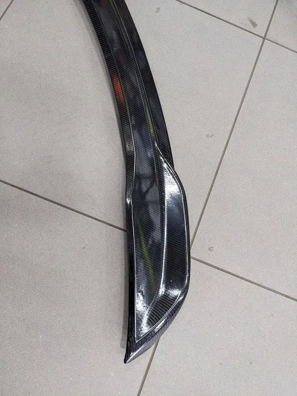 Honda_Civic_2022-2026_Carbon_Fiber_Trunk_Spoiler_featuring_a_sleek_design_aerodynamic_performance_and_a_lightweight_yet_durable_build_for_a_sporty_appearance._10