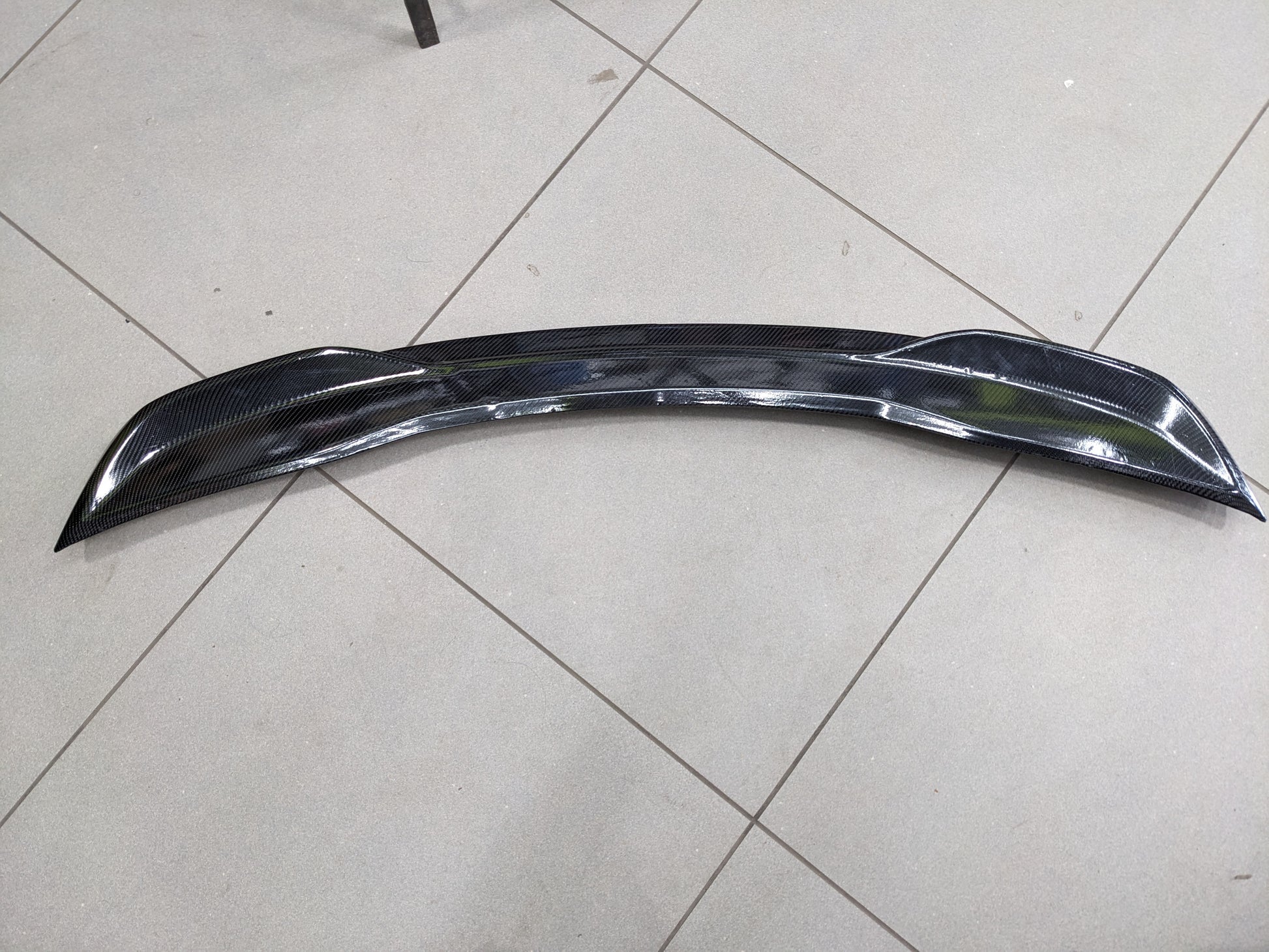 Honda_Civic_2022-2026_Carbon_Fiber_Trunk_Spoiler_featuring_a_sleek_design_aerodynamic_performance_and_a_lightweight_yet_durable_build_for_a_sporty_appearance._10