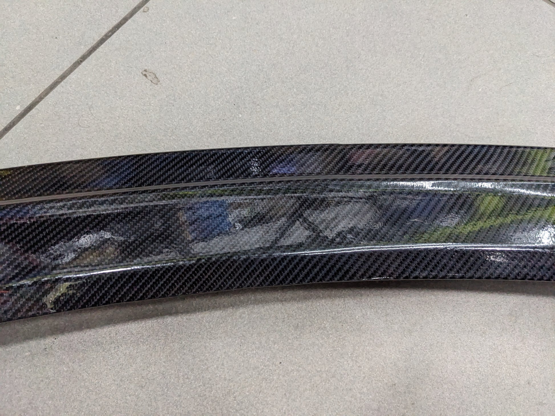 Honda_Civic_2022-2026_Carbon_Fiber_Trunk_Spoiler_featuring_a_sleek_design_aerodynamic_performance_and_a_lightweight_yet_durable_build_for_a_sporty_appearance._10