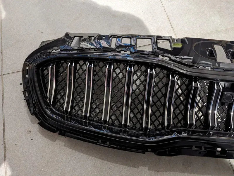Kia Sportage glossy front grill, designed to add a sleek and premium touch to your vehicle’s front-end appearance.