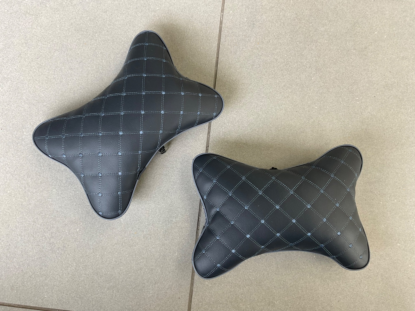 "Memory foam car neckrest cushion with ergonomic design, breathable cover, and adjustable strap for ultimate comfort."

