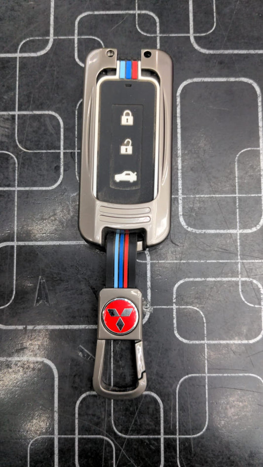 Mitsubishi Metal Key Cover – Sleek and durable protection for your Mitsubishi car key.
