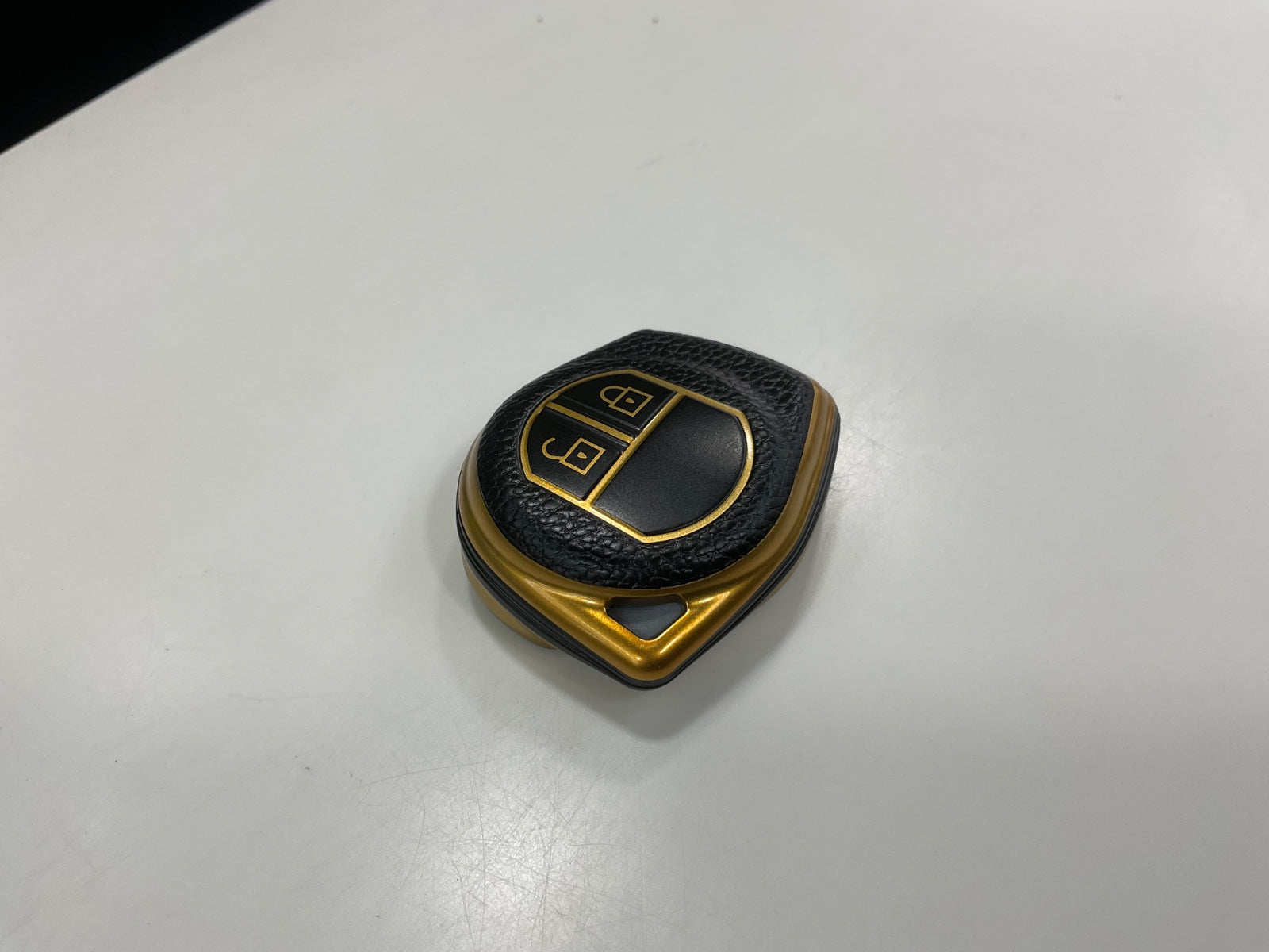 "Protective key cover showcasing design and fit for Suzuki Alto"
