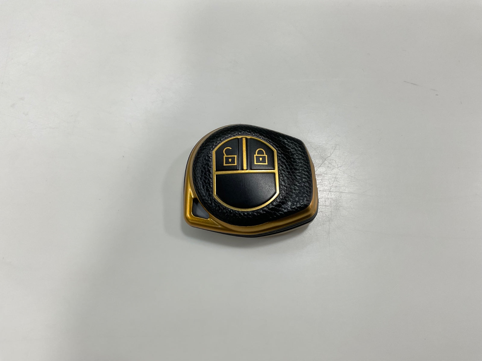 "Protective key cover showcasing design and fit for Suzuki Alto"
