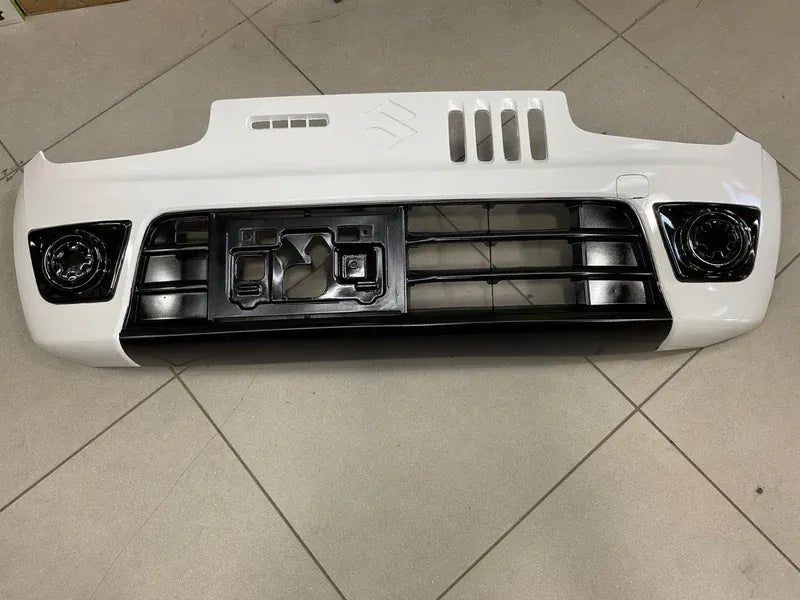Style-X Front Bumper for Suzuki Alto 2014-2026, made from ABS plastic with fog light compatibility, offering a stylish and durable exterior upgrade.
