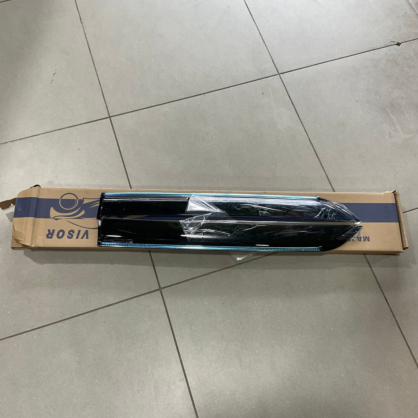 Suzuki Alto Air Press Sun Visor with chrome finish, custom-fit for models 2014-2026, providing protection against weather elements and enhancing style.
