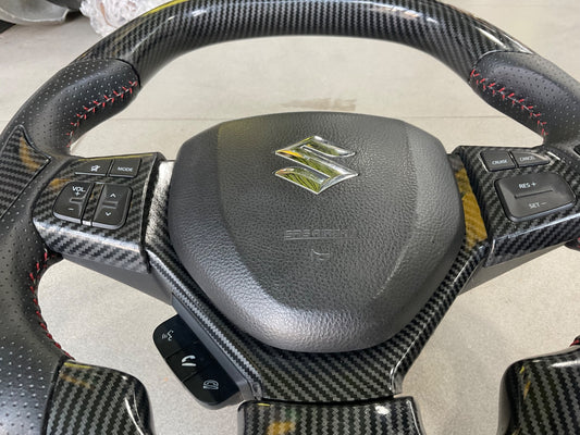 Suzuki Cultus 2018-2025 Carbon Fiber Multimedia Steering – Sporty & Functional
