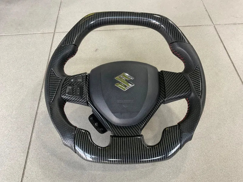 Suzuki Cultus 2018-2025 Carbon Fiber Multimedia Steering – Sporty & Functional