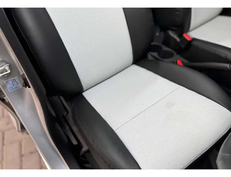 Suzuki New Alto seat cover and steering cover set, providing premium protection and stylish comfort for your vehicle.
