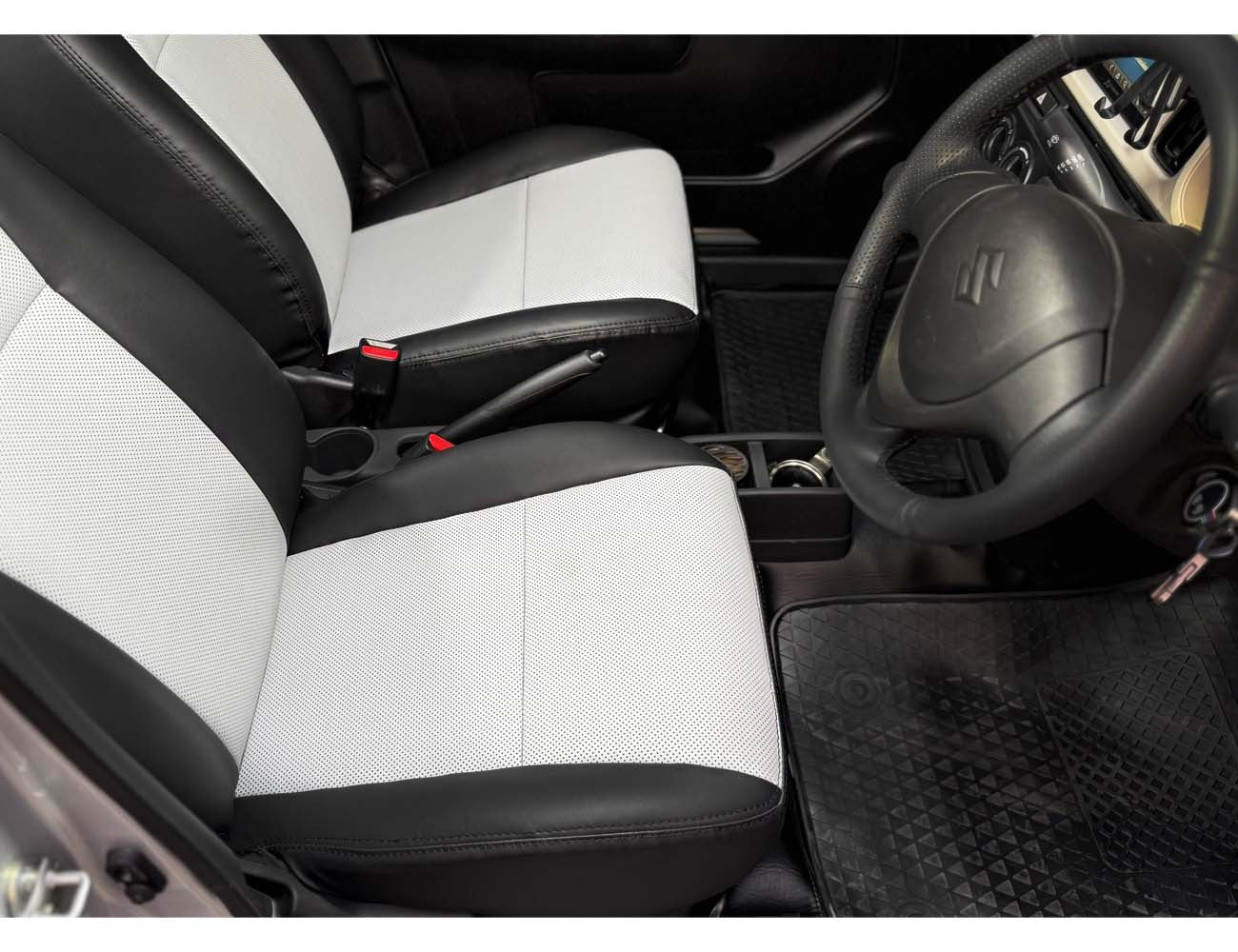Suzuki New Alto seat cover and steering cover set, providing premium protection and stylish comfort for your vehicle.
