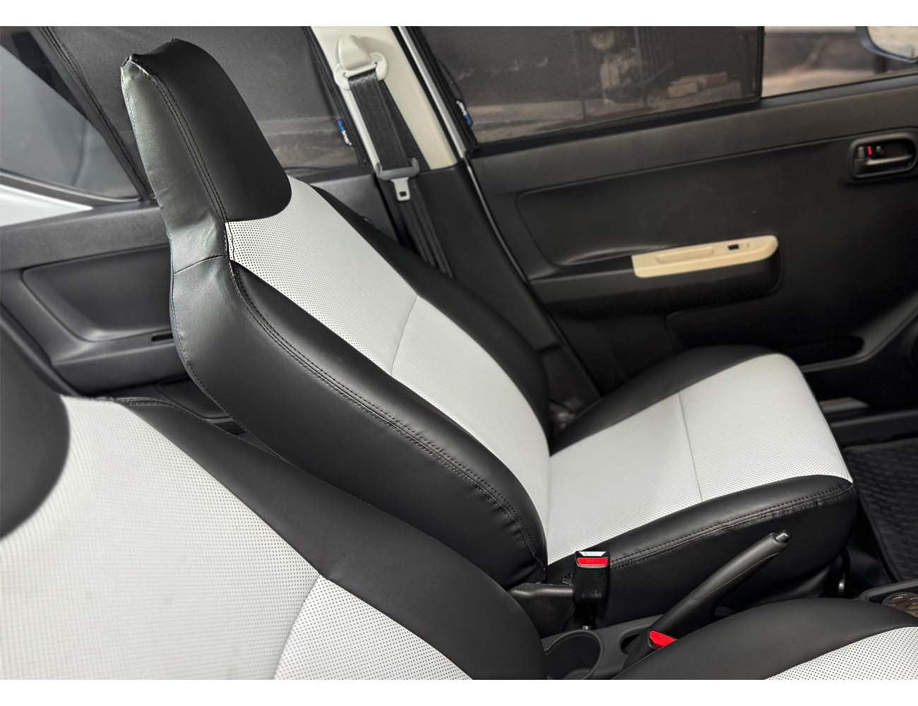 Suzuki New Alto seat cover and steering cover set, providing premium protection and stylish comfort for your vehicle.
