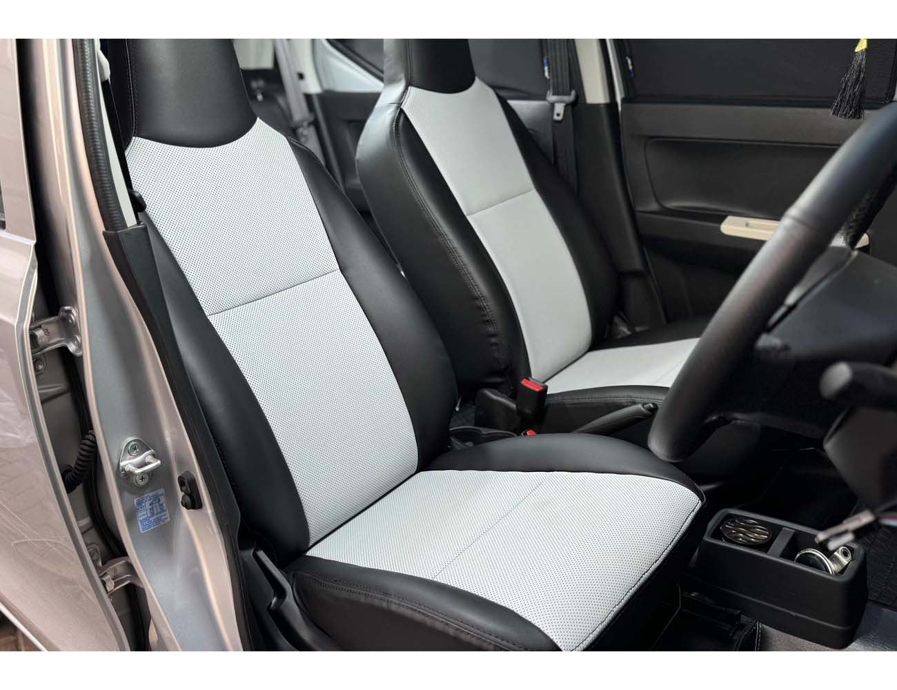 Suzuki New Alto seat cover and steering cover set, providing premium protection and stylish comfort for your vehicle.
