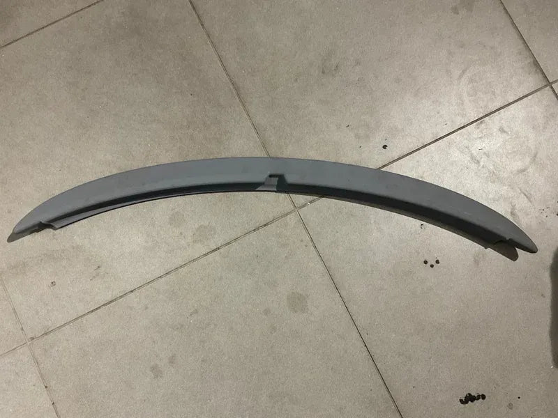 Toyota Vitz ABS plastic roof spoiler with a sleek and sporty design, offering durability and weather resistance.