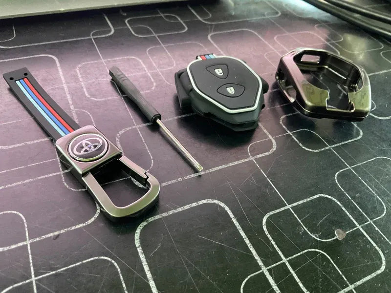 Toyota Vitz metal key cover offering premium durability, protection, and a stylish design for car keys.
