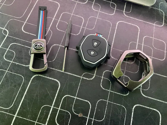 Toyota Vitz metal key cover offering premium durability, protection, and a stylish design for car keys.
