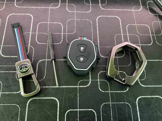 Toyota Vitz metal key cover offering premium durability, protection, and a stylish design for car keys.

