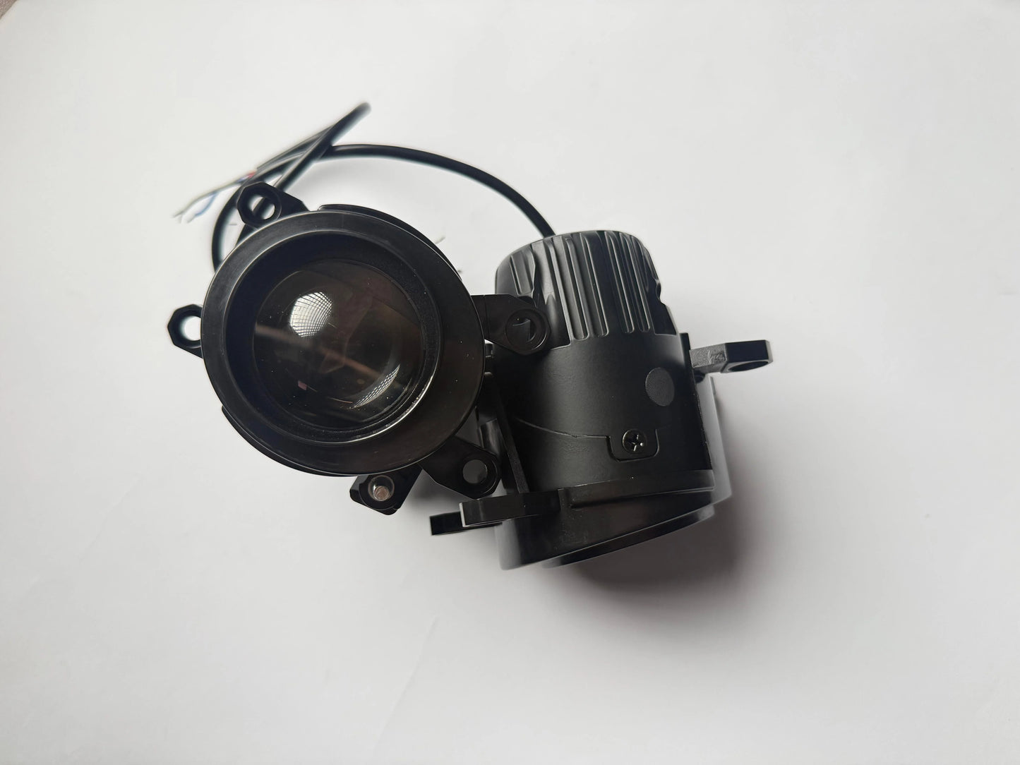 Universal L Series 2 inch projector light with focused beam lens design for improved automotive visibility and premium lighting performance